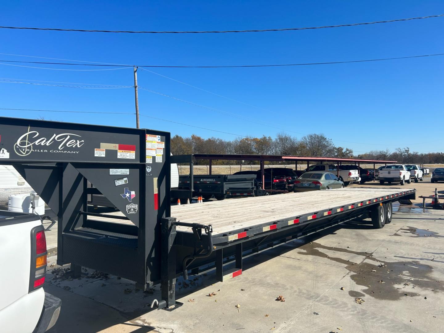 2022 BLACK CALTEX FLATBED (4C9GF4023NM) , located at 17760 Hwy 62, Morris, OK, 74445, 35.609104, -95.877060 - 2022 CALTEX FLATBED IS 40FT, GVWR 14,000, HEAVY DUTY SLIPPER SPRING SUSPENTION, ALL WHEEL ELECTRIC BRAKES ON ALL AXLES, 12' I-BEAM, FRONT LOCKING CHAIN BOX WITH LID, 8’ SLIDE IN RAMPS, DUAL 12,000 lb DROP LEG JACKS $8,500 CALL RUSS OR JONA AT 918-733-4887 - Photo#0